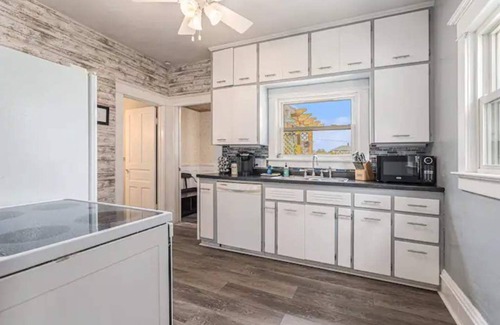 Three Oaks Haus | Renovated Victorian Home with Private Garden & Fire Pit!