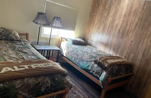 Navajo Dam Haus | River front fishing house close to Quality Waters and Navajo State Park