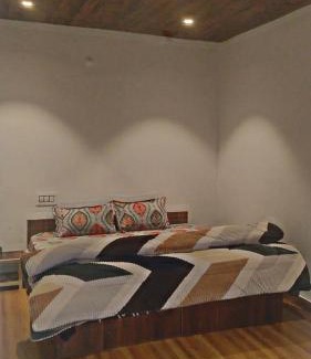 Shamshi Haus | River side cafe guest cottage