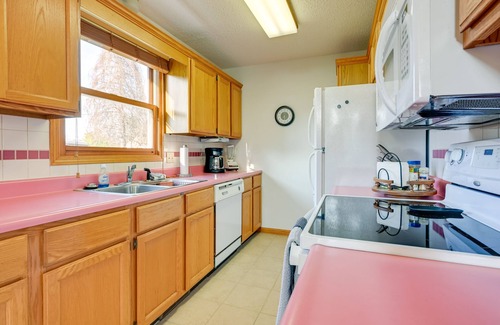 Au Gres Hütte | Riverfront Au Gres Cottage w/ Fire Pit & Grill!