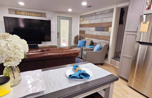 Carrabelle Haus | Riverfront Retreat- Fishing Dock, Screen Porch, Shaded Lawn, Adirondack Chairs