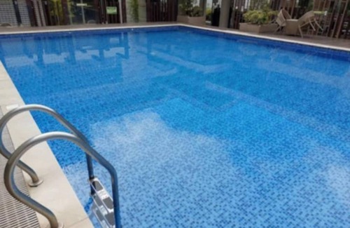 Cagayan de Oro Eigentumswohnung | Romantisches Lila mit 1 Schlafzimmer für 5–8 Personen in CDO