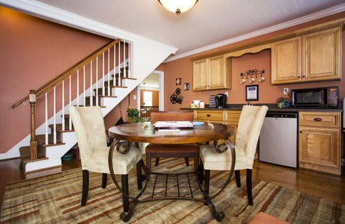 La Grange Bed & Breakfast | Room with a View King Luxury Suite with extra-large large soaking tub and a chaise lounge with a view of the pond.