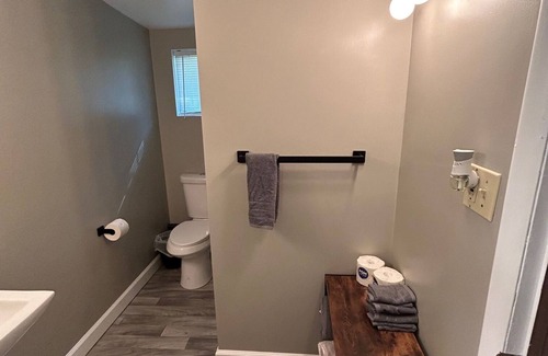 Palmyra Hütte | Rustic cabins in secluded campground with lake access and woods to wander in.