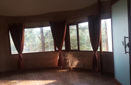 Kaimane Wohnung | Rustic Charm Wayanad - The Stump (Treetop Suite)