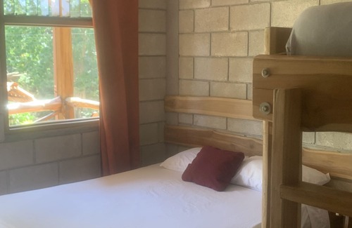 Marbella Kabine | Rustic jungle lodge in a tranquil garden setting - Room 6 Family room