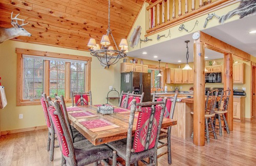Necedah Haus | Rustic, spacious, lakefront home with private boat slip, game room & gazeebo