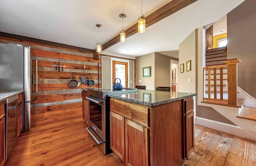 Blacksburg Haus | Rustic log cabin with modern comforts, scenic views, and cozy spaces for the perfect getaway.