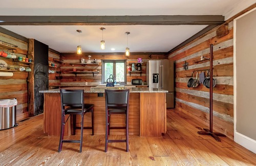 Blacksburg Haus | Rustic log cabin with modern comforts, scenic views, and cozy spaces for the perfect getaway.