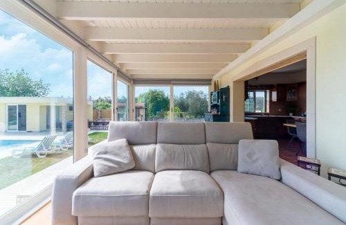 Camparca Haus | Rustic Spa Retreat in Netos
