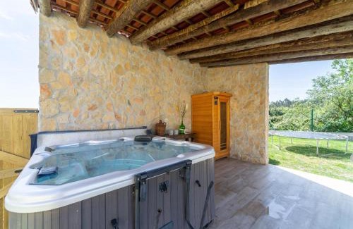 Camparca Haus | Rustic Spa Retreat in Netos