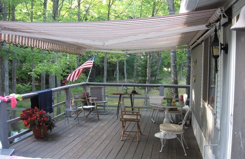 Mesick Kabine | Rustic Treehouse on fabulous private boating, fishing and swimming lake