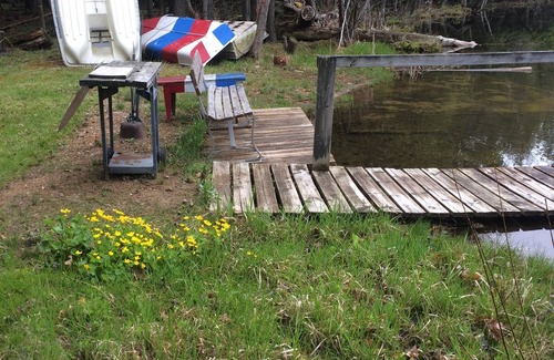 Mesick Kabine | Rustic Treehouse on fabulous private boating, fishing and swimming lake