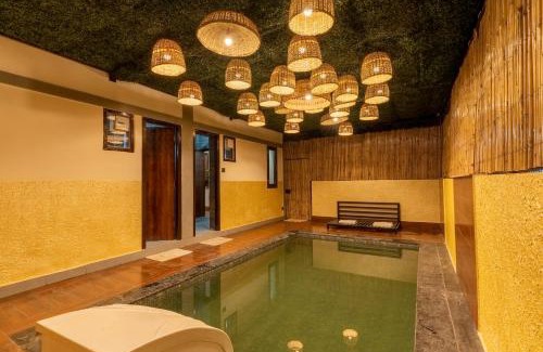 Bhimtal Haus | SaffronStays Kurmavana, Bhimtal - luxury cottage with pool and lawn - All clear roads