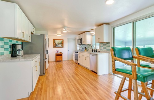 Onsted Haus | Sand Lake Retreat: Canal Access & Large Yard!