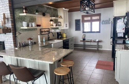 Shell Lake Haus | Sandy Shell Lake Shining Bright