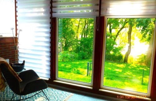 Rosenow Haus | Schwandt-ein Bungalow mit Wasserblick, Ruderboot auf Anfrage