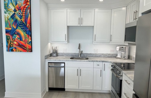 Colliers Bay Eigentumswohnung | Sea Glass at the Reef - Luxury King Beach Front Condo On The Beach