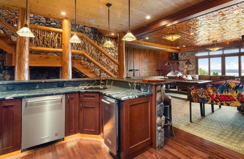 Kewadin Haus | Secluded Luxury Lodge Overlooking Torch Lake with Hot Tub, Elevator on Hilltop!