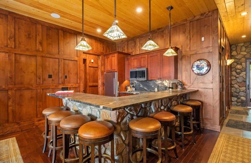 Kewadin Haus | Secluded Luxury Lodge Overlooking Torch Lake with Hot Tub, Elevator on Hilltop!