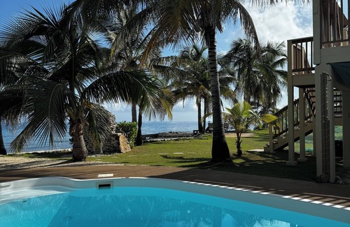 West End Haus | Secluded Sunsets 3400 Sq Ft Villa with 3 Separate Suites on the Ocean with Pool!