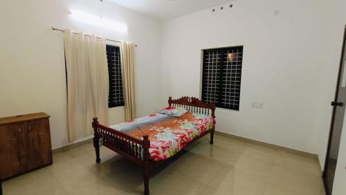 Karunagappally Haus | Serene Oasis Amritapuri Vavvakavu