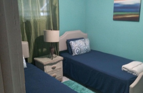 Cotton Tree Bay Haus | Serenity On The Bay2 - Two Bed Apt Close to Supermarkets, Shops and Restaurants!