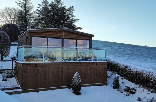 Portaferry Skihütte | Set on an elevated private site with commanding views over Strangford Lough.