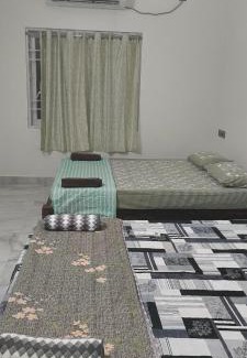 Gokarna Haus | Shri Virajita - Budget AC twin bed- room