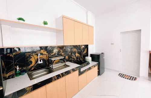 Tuk Tuk Hotel | Simangande View & Resto By Helocus