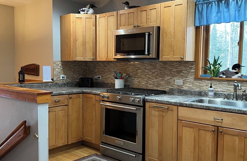 Butternut Haus | Slice of Heaven with 3,000' Shoreline on the "Crown Jewel" in the Northwoods