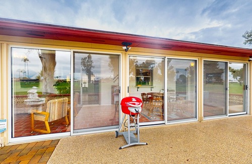 Sunland Village Haus | Snowbird-friendly golf-front home with pool, hot tub, grill, smart TVs, W/D, AC