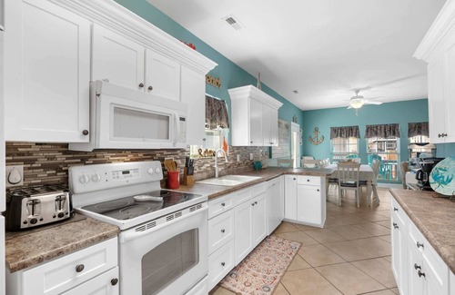 Surfside Beach Haus | Soak in the salty breeze on the awesome deck with a great ocean view! Site 920