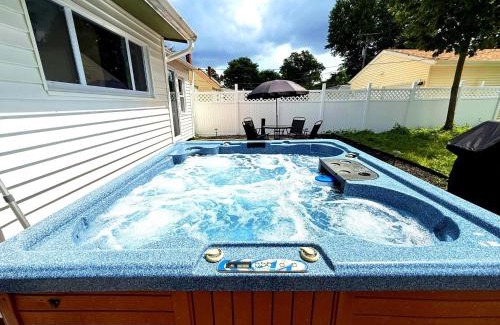 South Euclid Haus | South Euclid 4BR Luxe Escape with Hot Tub and BBQ