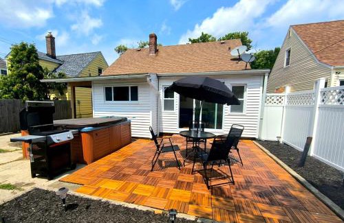 South Euclid Haus | South Euclid 4BR Luxe Escape with Hot Tub and BBQ