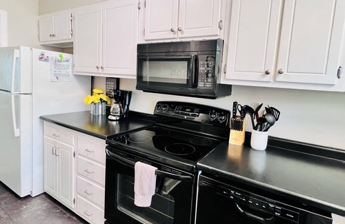 Golden Mile Haus | Spacious and Central Family/Pet Friendly Townhome with Pool, Half Mile to Beach!