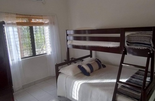 Corozal Haus | Spacious, Serene, and Secure - Steps from the Caribbean Sea!