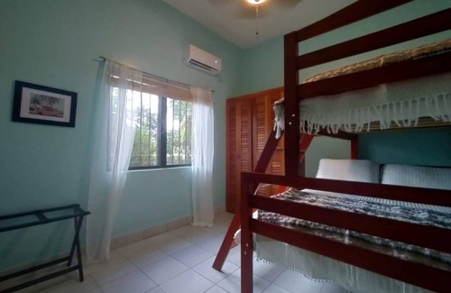 Corozal Haus | Spacious, Serene, and Secure - Steps from the Caribbean Sea!
