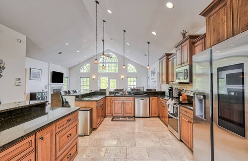 Morgan II Haus | Sprawling waterfront home with a boat launch, kayaks, game room, and hot tub