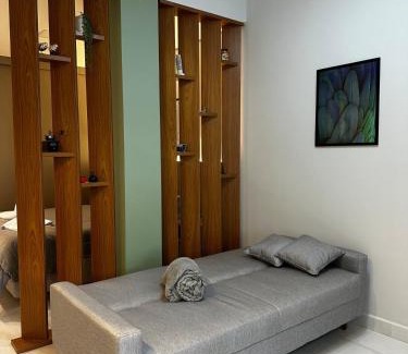 Regiao Urbana Homogenea X Wohnung | Studio Aconchego Poços - Minimalista e bem localizado