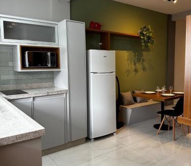 Regiao Urbana Homogenea X Wohnung | Studio Aconchego Poços - Minimalista e bem localizado