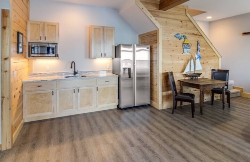 Suttons Bay Haus | Stunning Lakefront Home With Dock and Boat Lift