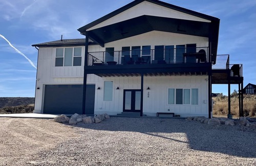 Sweetwater Haus | Stunning views 6-bedroom vacation home, with Private Beach Resort access.