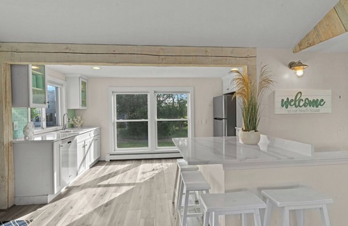 Kenyon Hütte | Stunning waterfront home with big yard & dock! Voted #1 rental in all of RI!