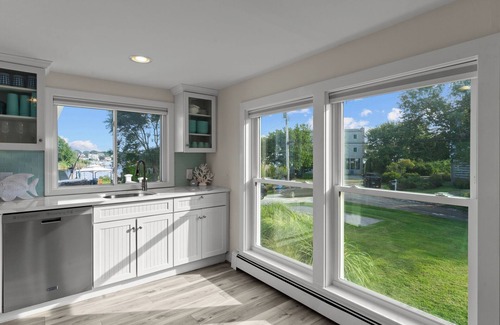 Kenyon Hütte | Stunning waterfront home with big yard & dock! Voted #1 rental in all of RI!