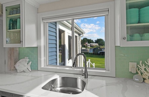 Kenyon Hütte | Stunning waterfront home with big yard & dock! Voted #1 rental in all of RI!