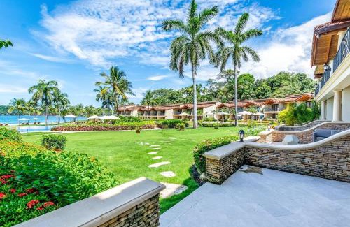 Playa Flamingo Haus | Stylish Split-Level Condo with a Shaded Terrace, Direct Beach Access, and Resort-Style Community Amenities