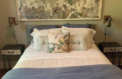 Laurel Haus | Stylish Suite in Laurel: Experience Hometown Magic