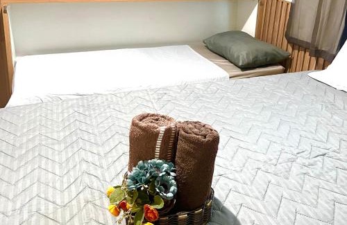 Foguete Hotel | Suíte 31 Privativa com ar condicionado, Frigobar, Vista lateral para o mar, 5 mts da praia