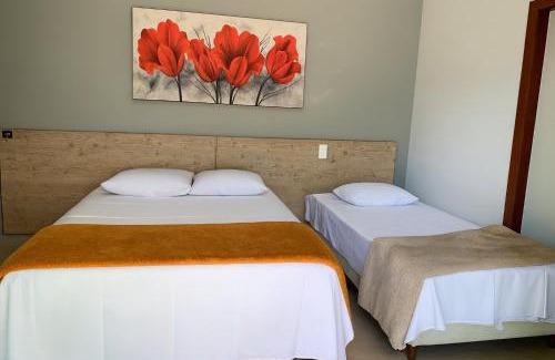 Capitolio Haus | Suíte com Vista para o Lago em Capitólio, acesso a piscina adulto e infantil, quadra de beach tênis e playgroud